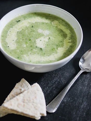 Add avocado leaf to boiling water to add flavor to soup