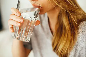 Drink lots of water to improve circulation