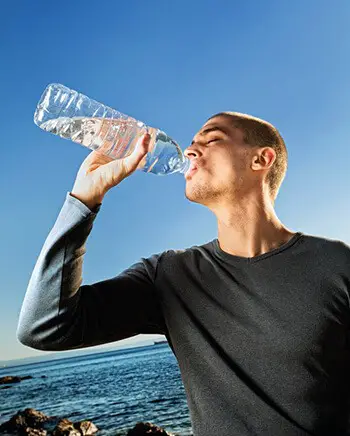Drinking enough water can do wonders for flushing out high levels of uric acid