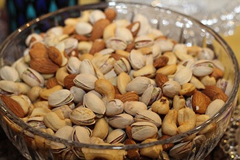 Foods with selenium like nuts are beneficial in treating Grave's Disease