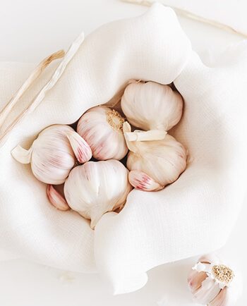Garlic has antifungal and antibacterial properties that protect nails from infection