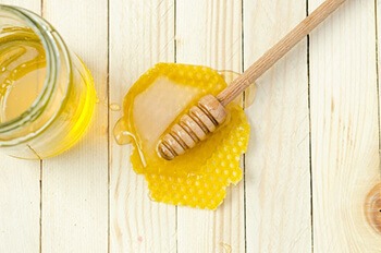 Honey is used in treating sore throat and mouth sores
