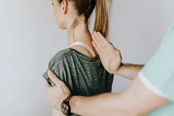 chiropractic manipulation can break up the muscle spasm and scar tissue helping to ease the pain