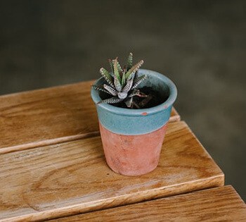 Add sponge at the bottom of your pot