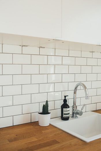 Clean grout using toothbrush