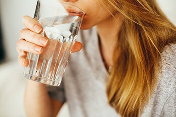 Drink lots of water to reduce double chin and bloated face