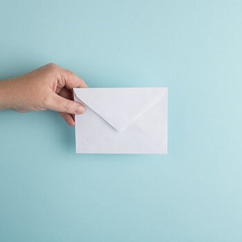 Use sponge to wet your envelope