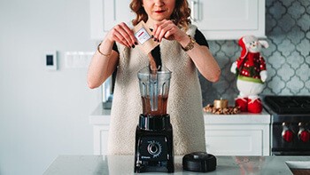 blend water and dish soap to clean your blender