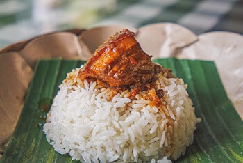 White rice with meat on top