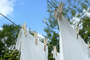 remove smell and prevent laundry from being stiff by using vinegar