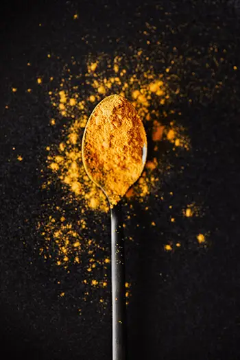 turmeric on spoon