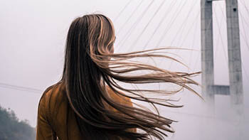 person with flowy hair