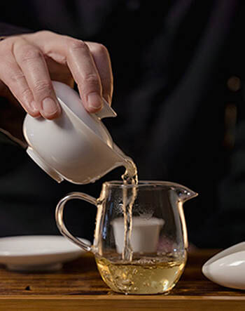 pouring green tea