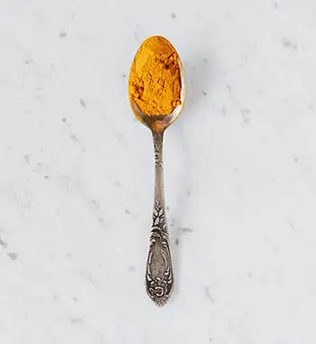 turmeric on spoon