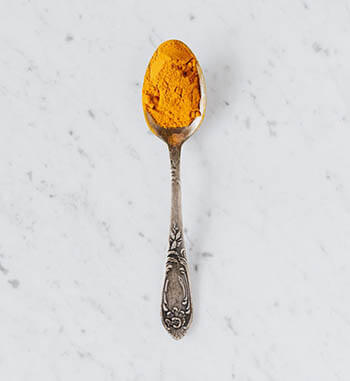 turmeric on spoon