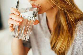 person drinking water