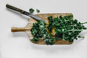 kale vegetable on chopping board