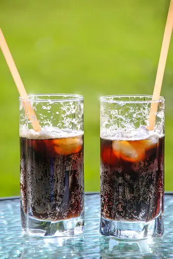 glasses with soda and straw