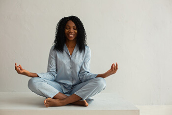 person doing the meditation pose