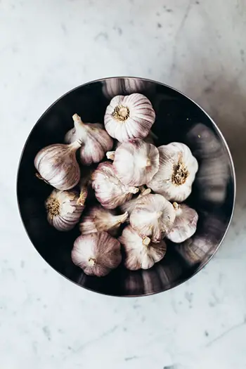a bowl of garlic