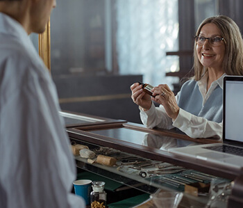 person buying over the counter medicine