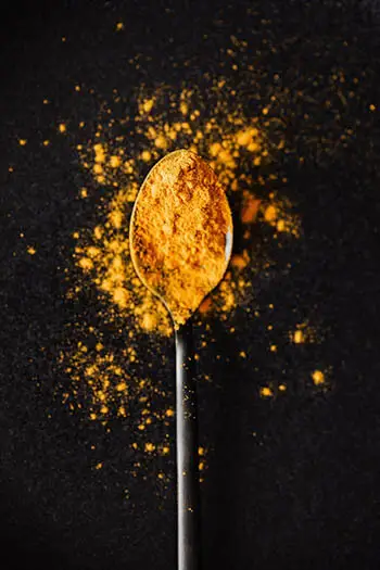 turmeric on spoon